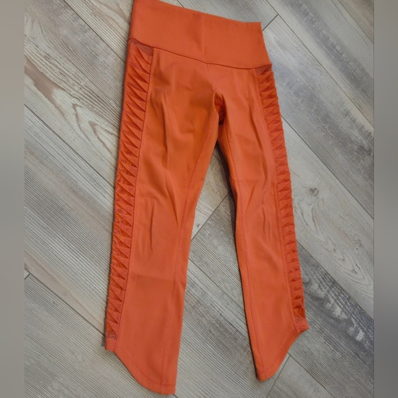 Lululemon Athletica Sunshine Salutation Bright Coral Cropped Leggings - Picture 6 of 10